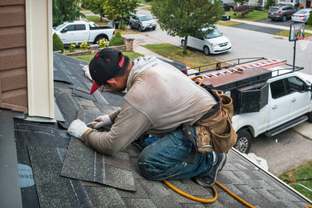 Professional Roofing technician working in Marion, KS